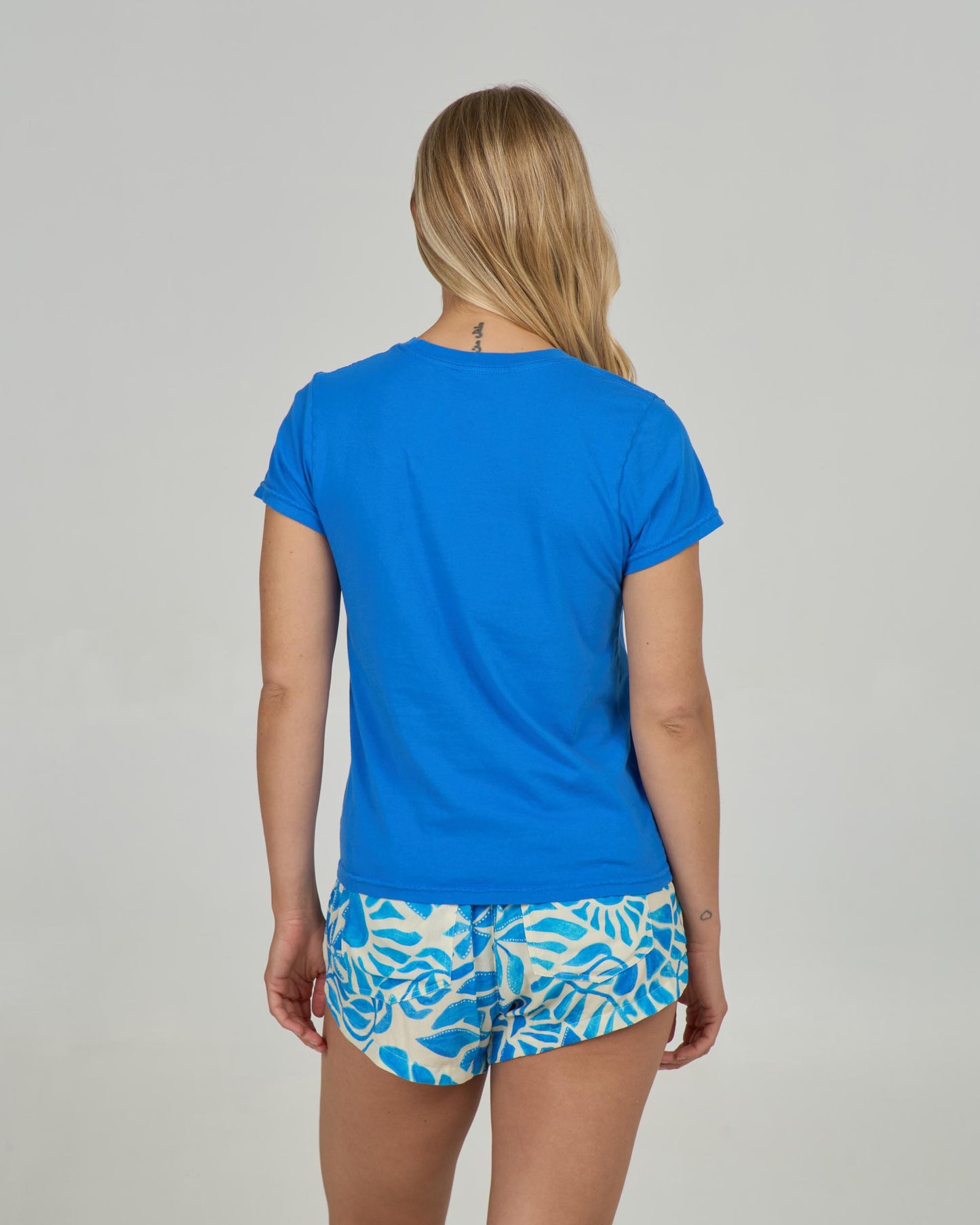 Back view of the Stamped Modern Tee - Bold Blue. 