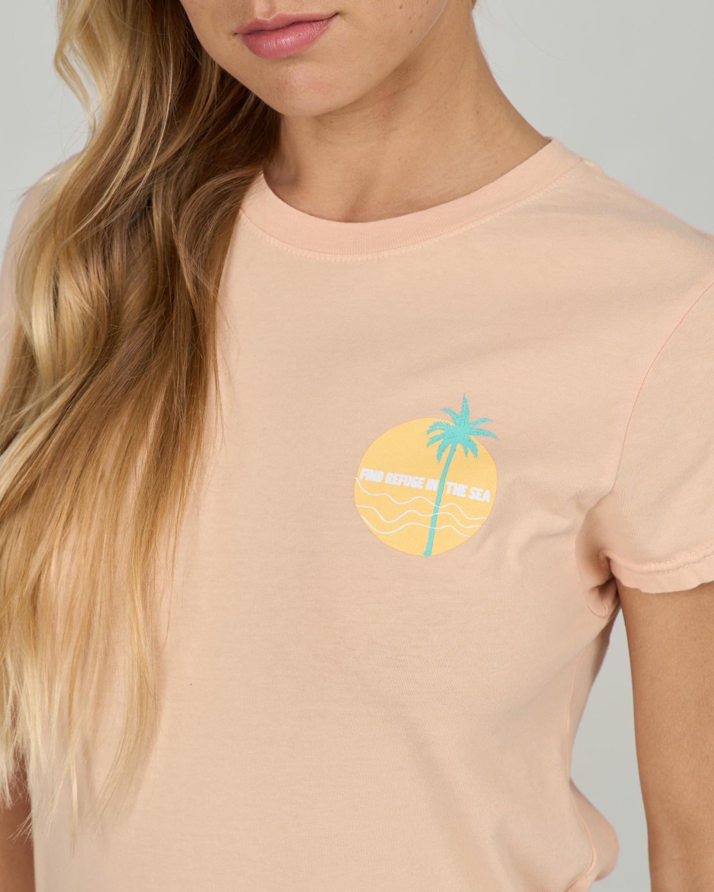 Close up front view of the Simplicity Modern Tee - Apricot. 