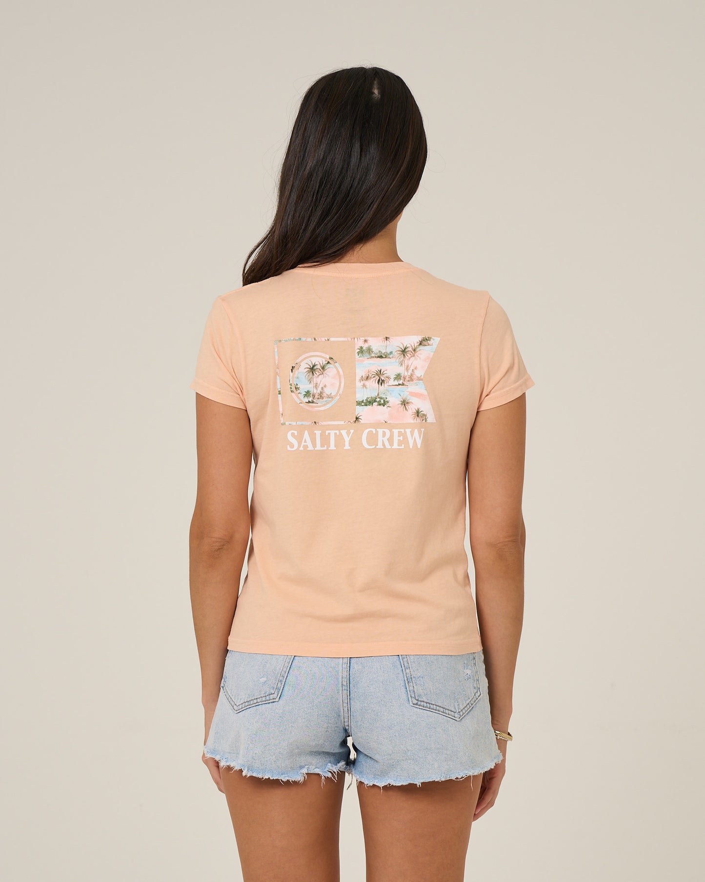 Back view of the Flagship Fill Modern Tee - Apricot. 