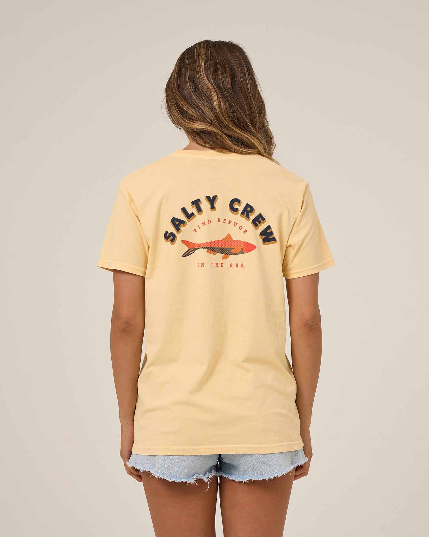 Back view of the Salty Sardine Boyfriend Tee - Custard. 