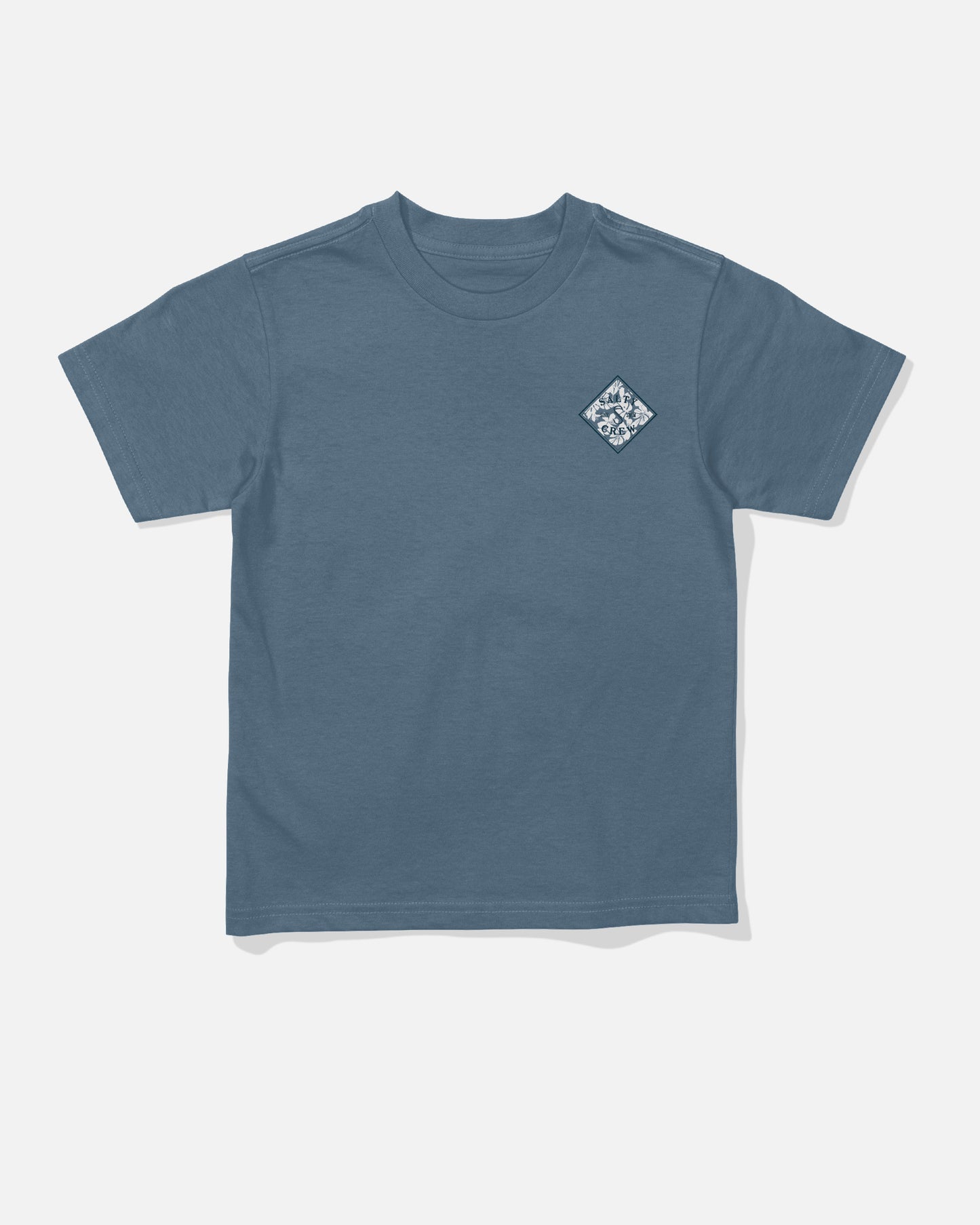Salty Crew Tippet Fill Toddler Tee in Slate, a blue short-sleeve combed ringspun cotton t-shirt featuring a small, white, diamond-shaped graphic screenprinted on the left chest. The shirt is displayed laid flat on a plain white background.