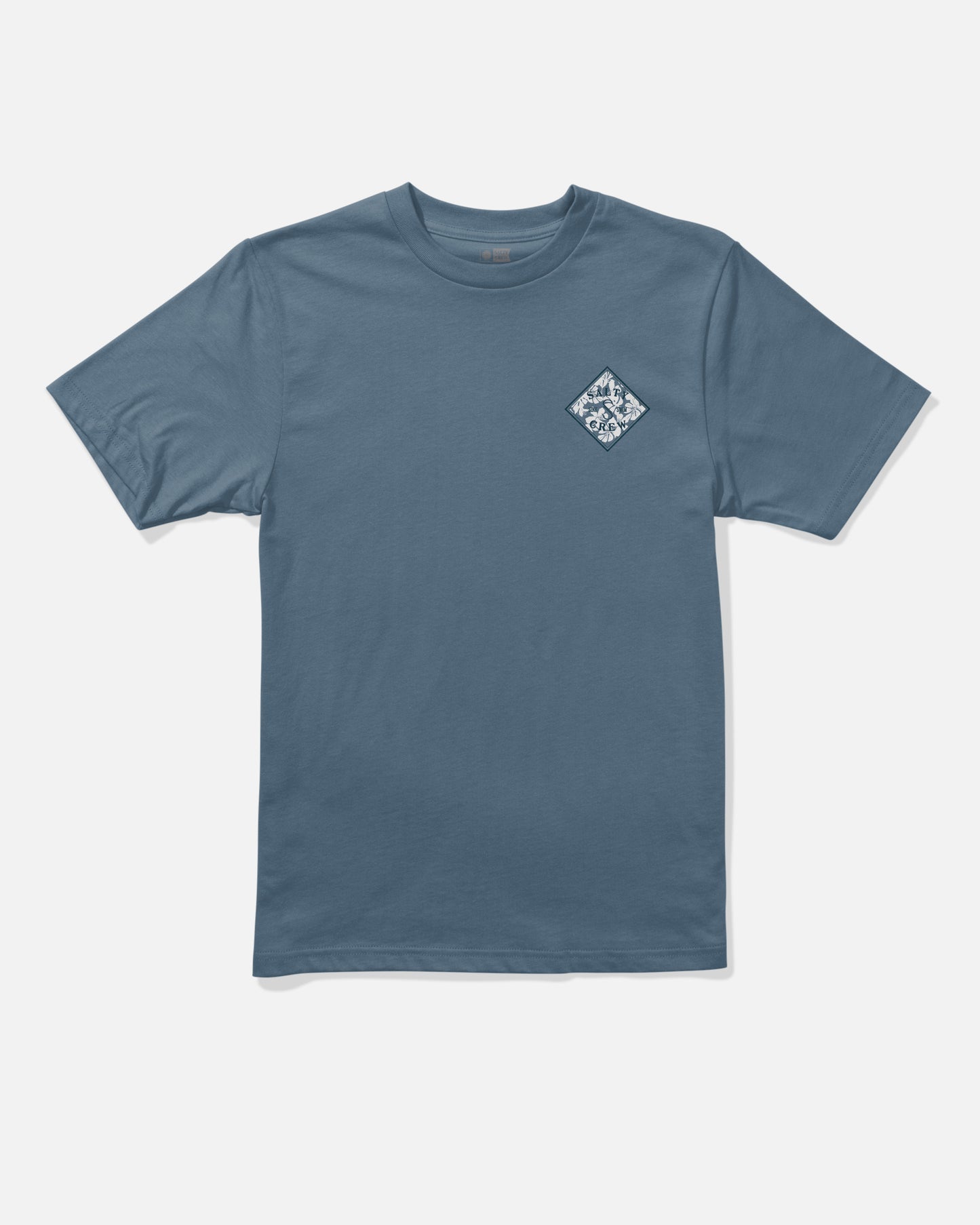 The Salty Crew Tippet Fill Boys Tee in Slate Blue is a short-sleeve shirt made from combed ringspun 100% cotton, featuring a small white and blue diamond-shaped graphic screenprinted on the left chest. The background is plain white.