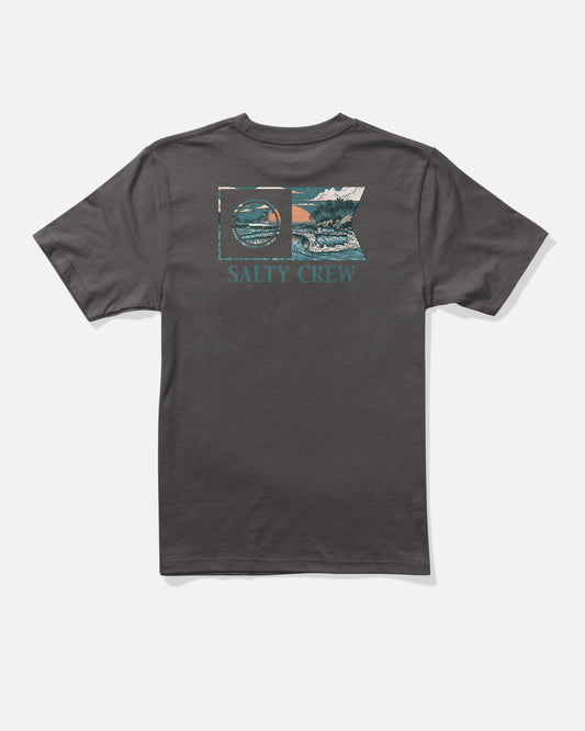 The Salty Crew Flagship Boys Tee in dark grey features a screenprinted rectangular graphic of a fish and ocean waves in teal, blue, white, and orange on the back, along with SALTY CREW text. Made from combed ringspun cotton.