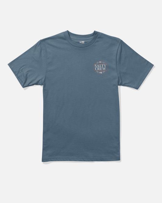 The Split Up Boys Tee by Salty Crew is a slate blue, short-sleeve cotton t-shirt featuring a small screenprinted Salty Crew logo on the upper left chest. The combed ringspun shirt is shown laid flat against a white background.