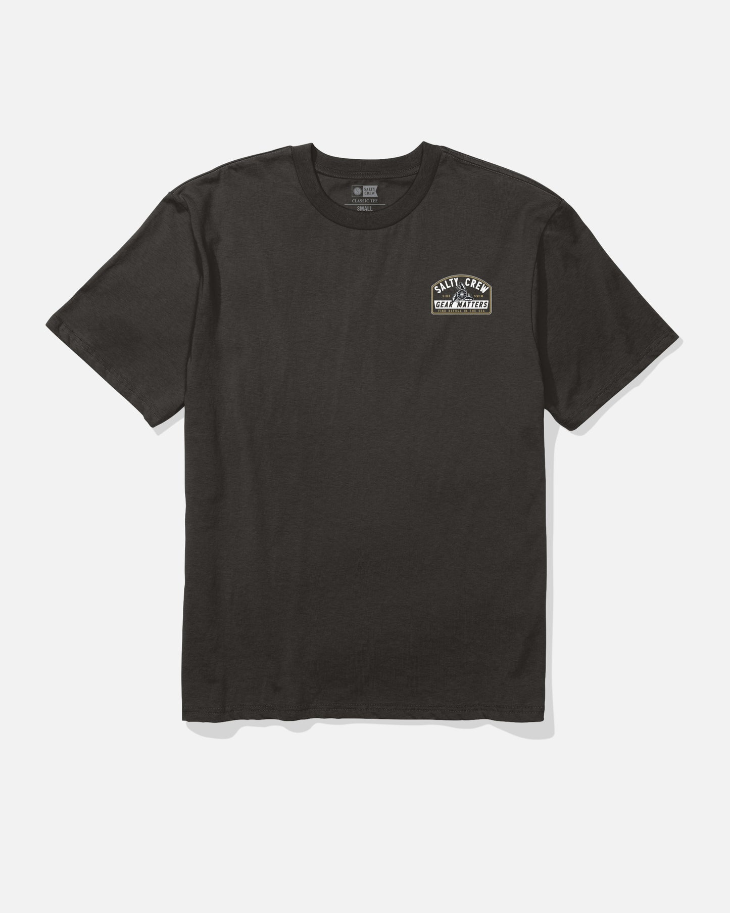 The Salty Crew Gear Shop Original Tee - Black is a short-sleeve shirt made from 100% cotton soft spun fabric, featuring a small white screenprinted graphic and text on the left chest, shown against a white background.