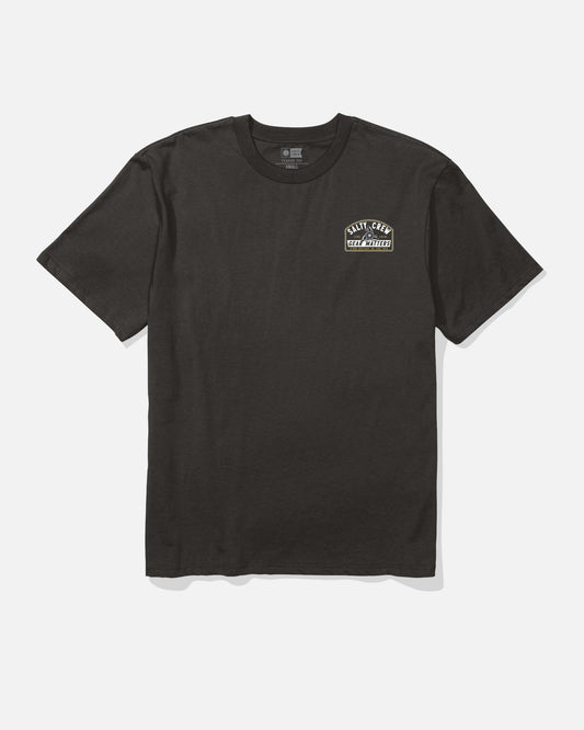 The Salty Crew Gear Shop Original Tee - Black is a short-sleeve shirt made from 100% cotton soft spun fabric, featuring a small white screenprinted graphic and text on the left chest, shown against a white background.