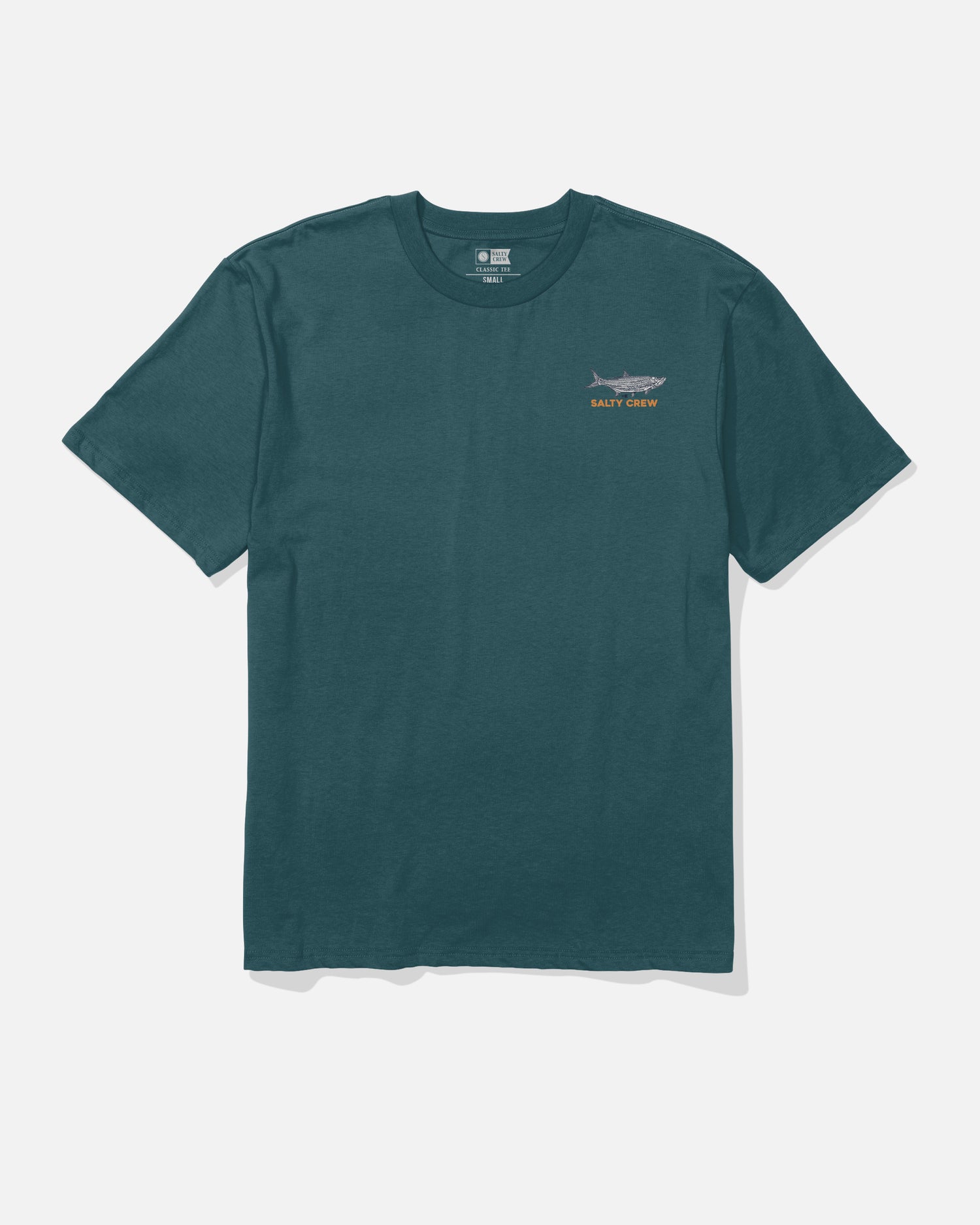 The Salty Crew Tarpon Original Tee in Atlantic Blue is a short-sleeve t-shirt crafted from 100% cotton with a soft spun feel, featuring a screenprinted small fish graphic and the words “Salty Crew” in yellow on the left chest. The shirt is laid flat on a white background.