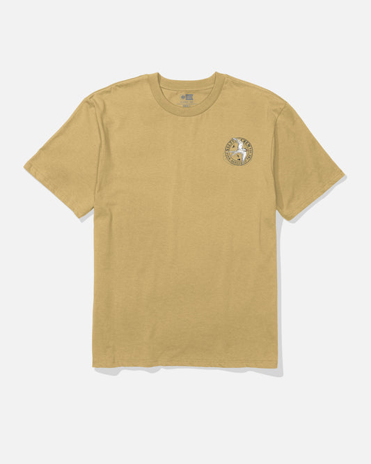 The Salty Crew Tern Original Tee in Mineral Yellow is a soft spun, short-sleeve cotton t-shirt featuring a small circular screenprinted graphic and text logo on the left chest. The shirt is shown laid flat on a white background.
