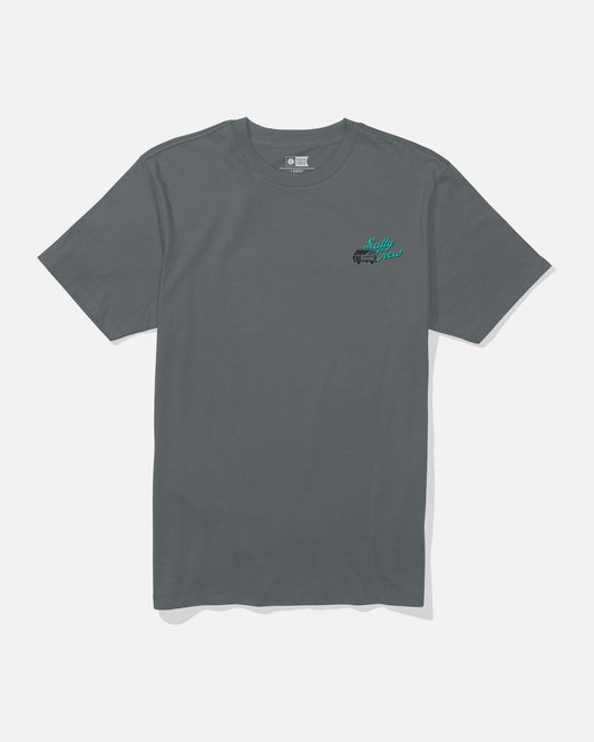 The Salty Crew Truck Bed Crew Tee in Charcoal is a short-sleeve cotton t-shirt featuring a small green and white screenprinted graphic on the left chest, shown against a plain white background.