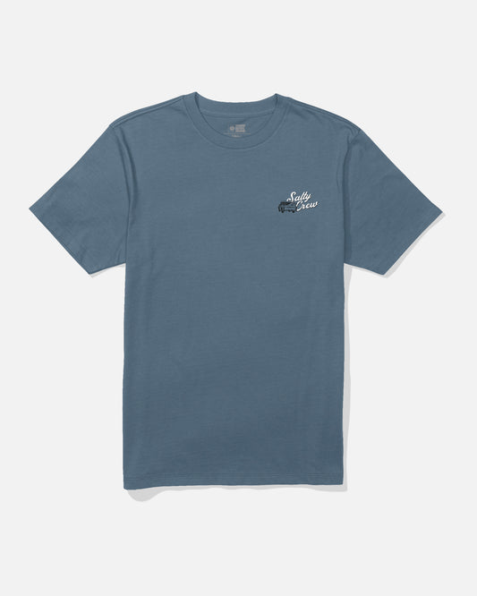 The Salty Crew Truck Bed Crew Tee in Slate is a short-sleeve t-shirt made from 100% combed ringspun cotton, featuring a small white and black Salty Crew logo screenprinted on the left chest. It is displayed on a white background.
