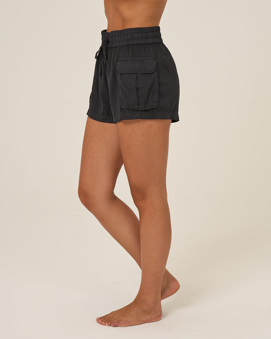 Profile view of the Driftwood Short - Black. 
