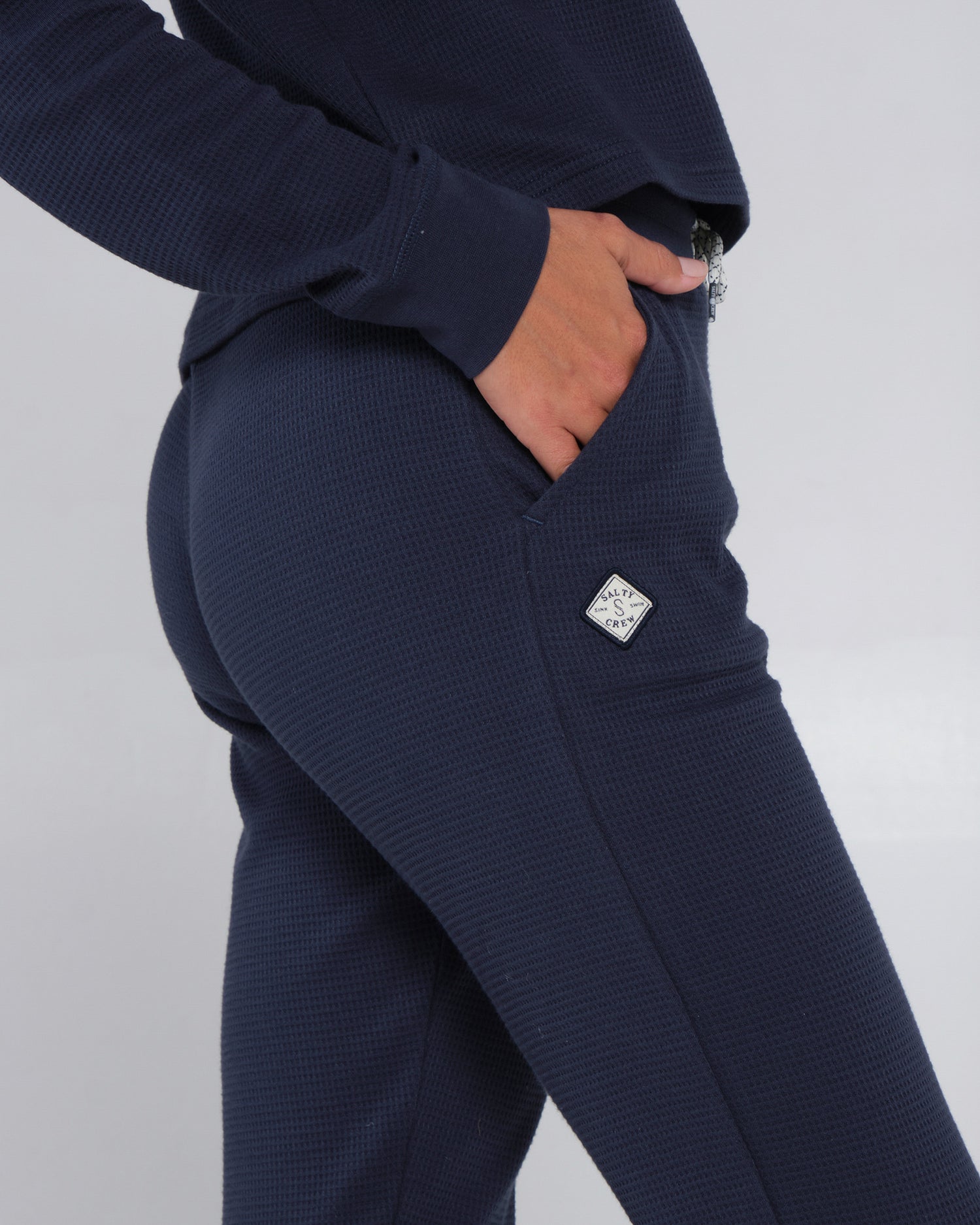 Close up shot of pocket detailing of the Tippet Dark Navy  Pant