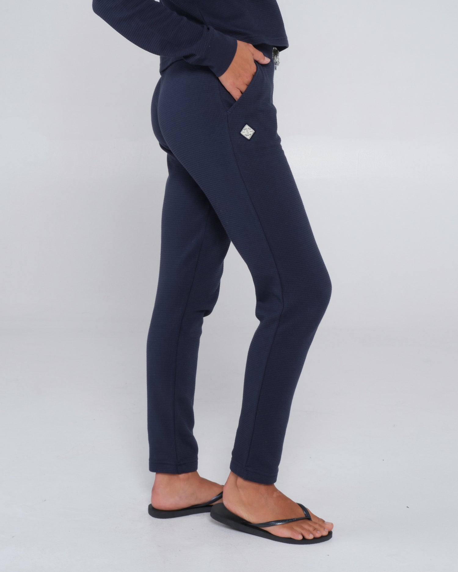 Side profile of the Tippet Dark Navy  Pant