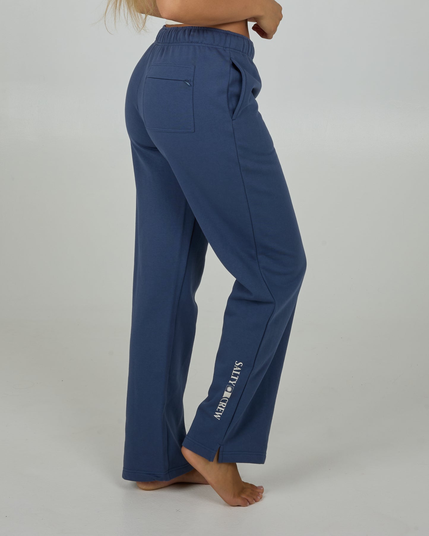 Profile view of the Flagship Pant - Indigo. 