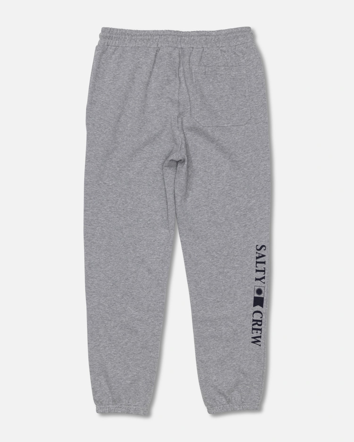 The Salty Crew Crewser Fleece Pant in Athletic Heather is shown laid flat on a white background. These gray sweatpants feature an elastic waistband and cuffs, with “SALTY CREW” screenprinted along the leg and a small black Salty Crew logo printed on the lower left side.