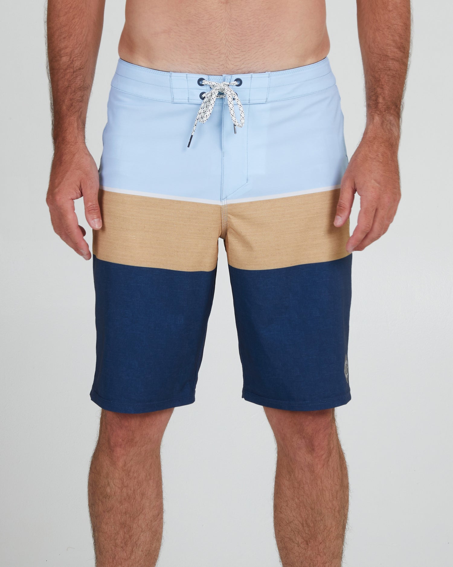 On body front of the Stacked Light Blue Boardshort