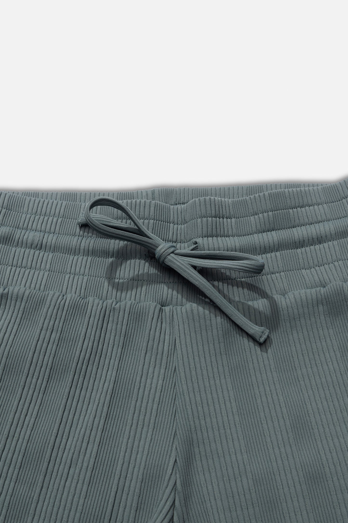 Detail photo of the wasit of the Seafarer Swim Short - Fin Blue. 