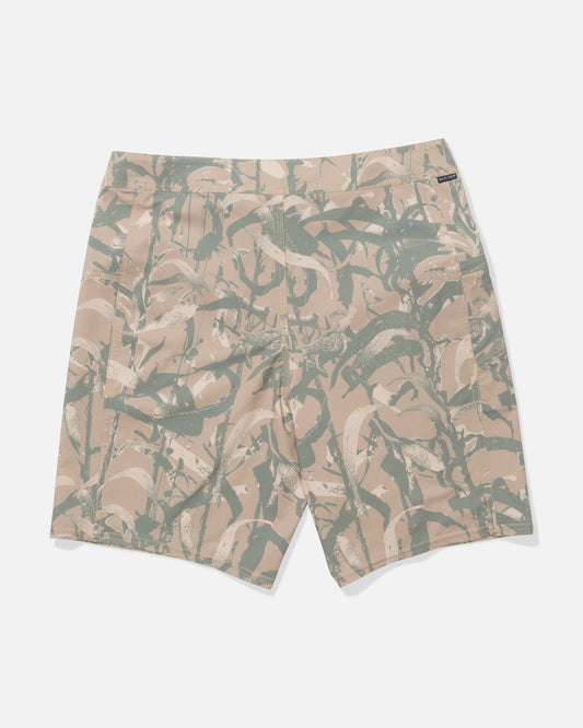 The Salty Crew Flagship 20" Boardshort in Kelp Camo showcases an abstract, beige and olive green brushstroke camouflage design, displayed flat with the back side facing up.