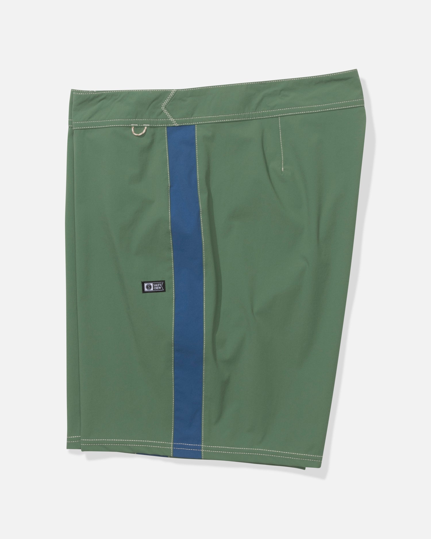 The Salty Crew Channel 18" Boardshort in Mid Green features white stitching, a blue off-center stripe, a black logo patch on the left, quick-dry fabric, and a metal grommet near the waistband, displayed on a plain white background.