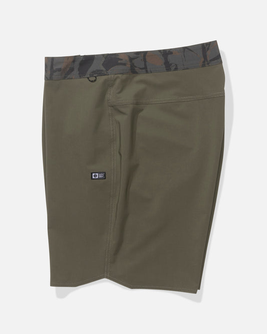 The Salty Crew Session 19" Boardshort in Dusty Olive features a black and green camo waistband, side seam, small logo tag on the right, and quick-dry performance fabric. Displayed on a white background.