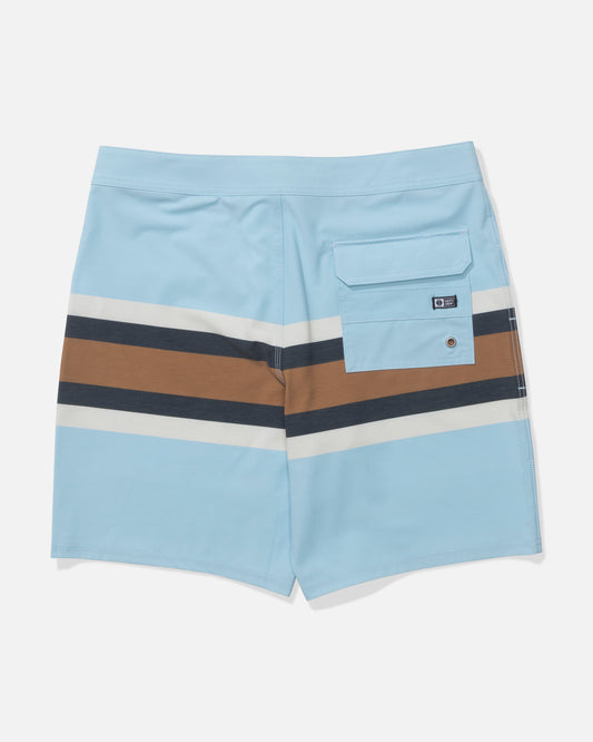 The Salty Crew Crew 19" Stripe Boardshort in Clear Sky features light blue comfort fabric with 4-way stretch, horizontal brown, white, and dark blue stripes on the back, plus a right-side rectangular flap pocket with a button closure.