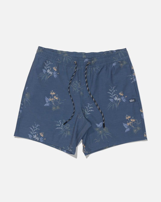 Introducing the Salty Crew Crew Volley 17″ swim shorts in Mid Blue, featuring a subtle floral print and crafted from recycled polyester for an eco-conscious choice. Designed with a black-and-white drawstring, small side logo tag, and a classic straight leg silhouette, these shorts are displayed laid flat on a white background.