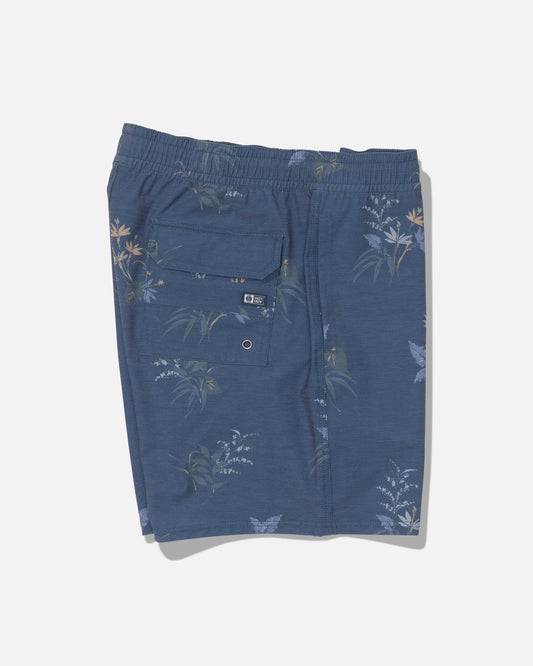 Salty Crew Crew Volley 17″ shorts in Mid Blue featuring a floral print, straight leg cut, and elastic waistband. Includes a back pocket with button flap and a small round metal ventilation grommet. Crafted from recycled polyester with 4-way stretch for comfort and flexibility. Shorts are shown laid flat against a white background.