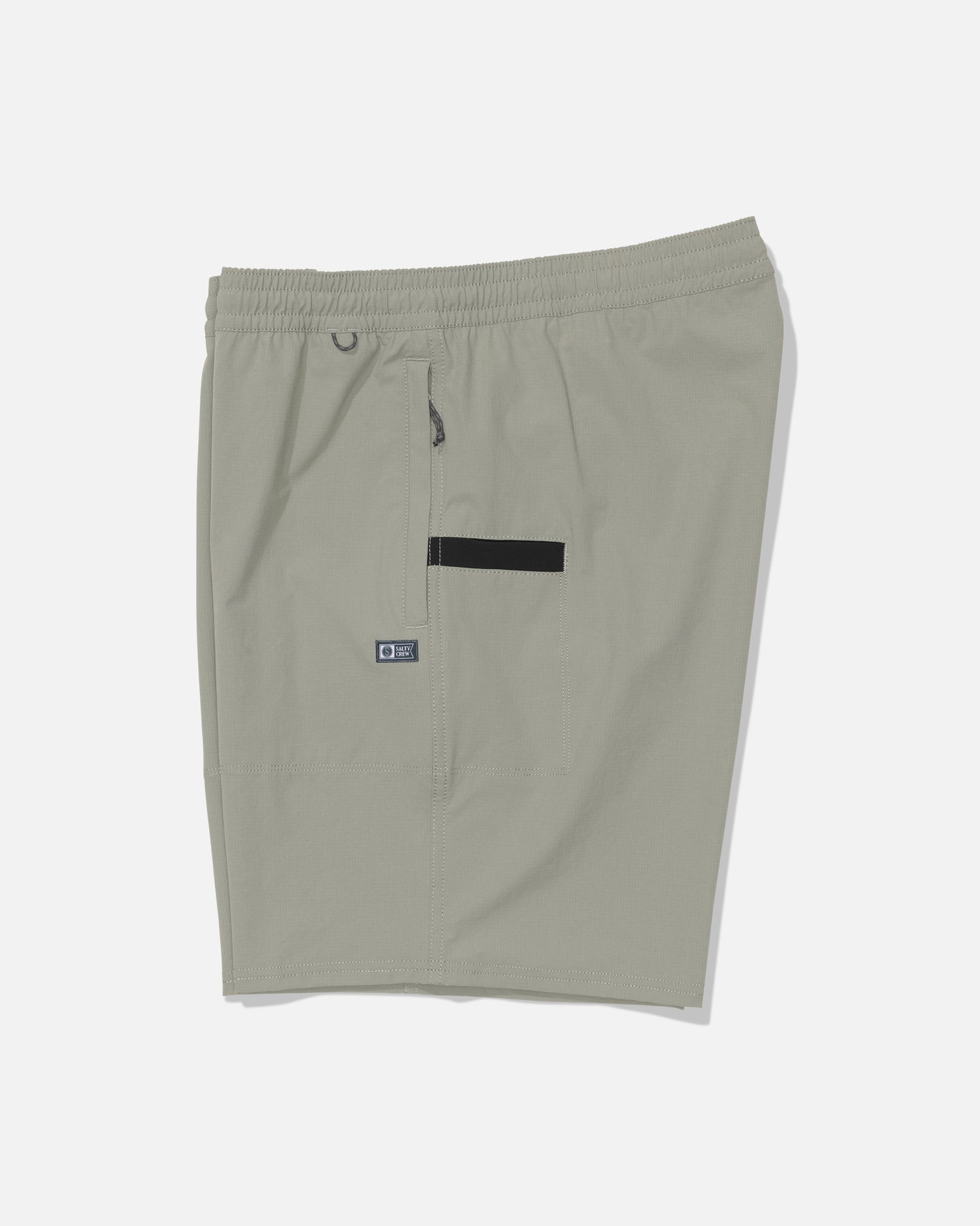 The Salty Crew Crew 18″ Ewaist Boatshort in Aqua Grey is displayed flat on a white background, featuring an elastic waistband, small logo tag, zipper pocket, and a black horizontal accent on the side. Made from quick-dry ripstop fabric, these shorts provide durability and comfort for every workout.