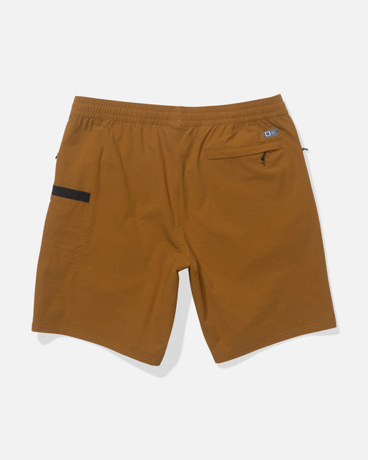 Salty Crew Crew 18" Ewaist Boatshort in Bronze Brown features quick-dry ripstop fabric, an elastic waistband, a black left-side accent, and two zippered pockets (right and back), shown laid flat on a white background.