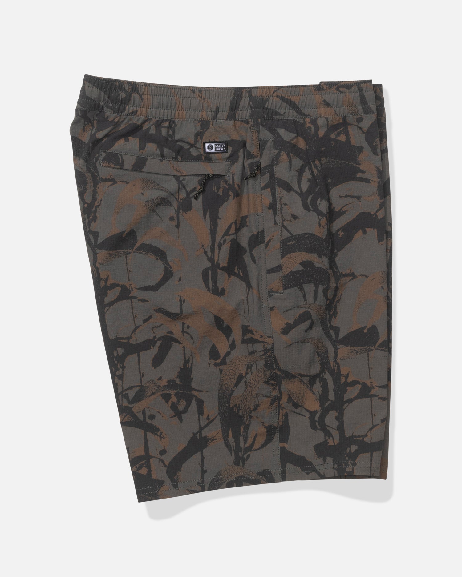 The Salty Crew Crew 18" Ewaist Boatshort in Dark Kelp Camo features knee-length ripstop shorts with an elastic waistband and a brown, black, and gray abstract camo pattern, shown flat against a white background.