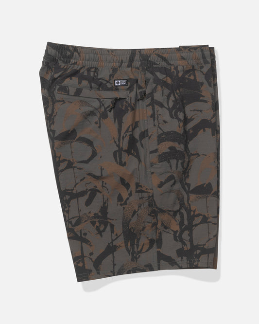 The Salty Crew Crew 18" Ewaist Boatshort in Dark Kelp Camo features knee-length ripstop shorts with an elastic waistband and a brown, black, and gray abstract camo pattern, shown flat against a white background.