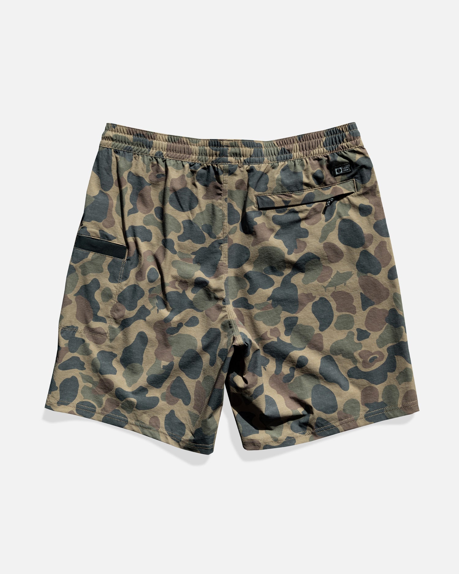 The Salty Crew Crew 18" Boatshort Ewaist in Sand Camo features quick-dry ripstop fabric, an elastic waistband, a zippered back pocket, and a side pocket, shown flat on a white background.