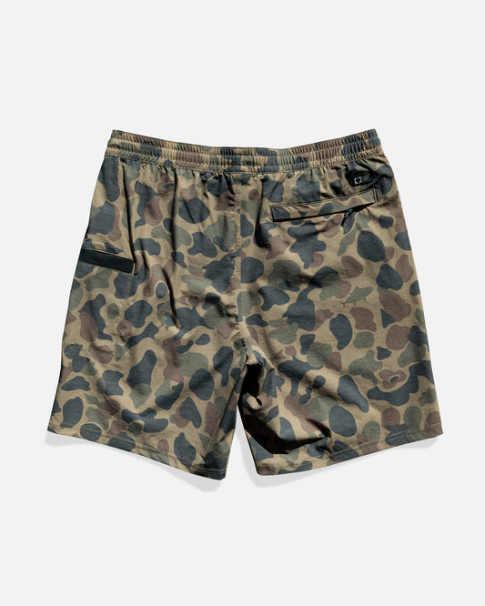 The Salty Crew Crew 18" Boatshort Ewaist in Sand Camo features quick-dry ripstop fabric, an elastic waistband, a zippered back pocket, and a side pocket, shown flat on a white background.