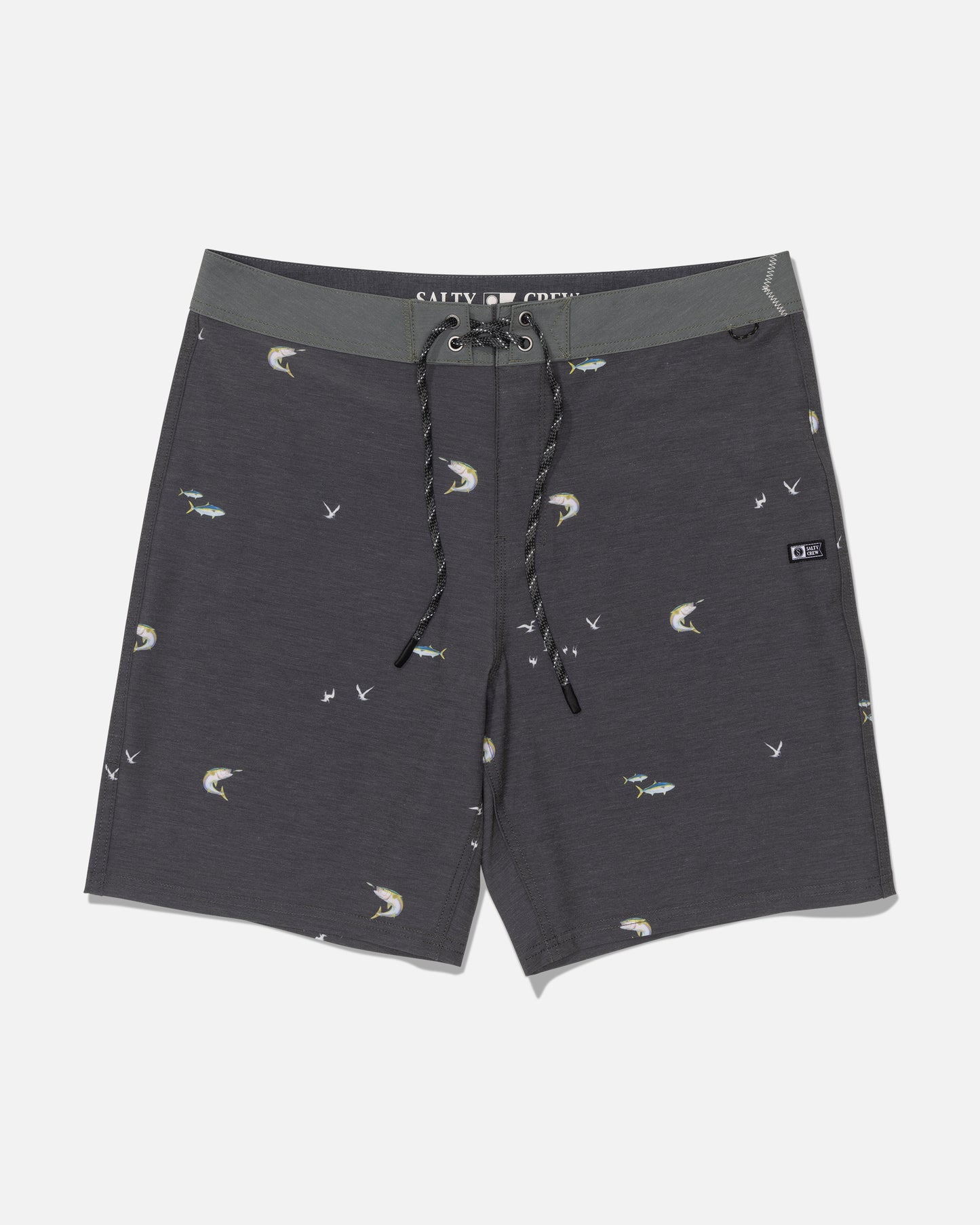 The Salty Crew “Crew 19” Boardshort“ in dark grey is crafted from recycled polyester and features a subtle fish and bird print, a black-and-white drawstring, and a small branded patch on the left leg. These straight-leg shorts are shown laid flat on a white background.