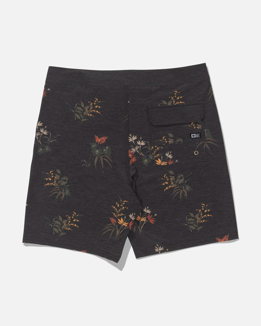 The Salty Crew Crew 19″ Boardshort in Off Black features a straight leg cut for a modern look, a subtle floral and butterfly pattern, a back pocket with button closure, and a small black label.