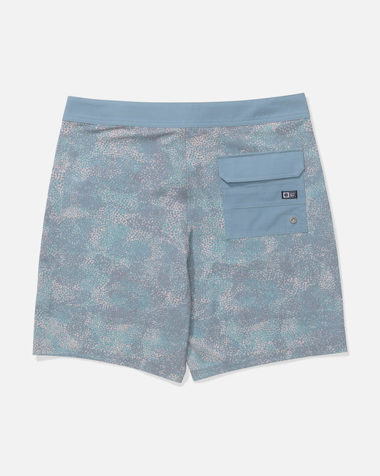 The Salty Crew Crew 19" Boardshort - Seaside features a subtle abstract blue pattern, 4-way stretch fabric, an elastic waistband, straight leg fit, and a right back flap pocket with a small logo tag.
