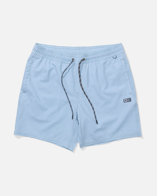 The Salty Crew Seadog Volley 17" shorts in Mineral Blue are made from performance 4-way stretch fabric with an elastic waistband, black drawstring, side pockets, and a small black logo patch on the left leg, shown on a plain white background.