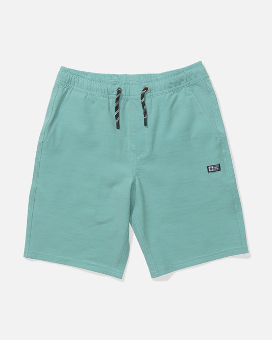 The Salty Crew Drifter 16" Boys Elastic Hybrid Shorts in Seaside feature quick dry fabric, side pockets, and a black logo patch on the right leg, displayed on a white background.