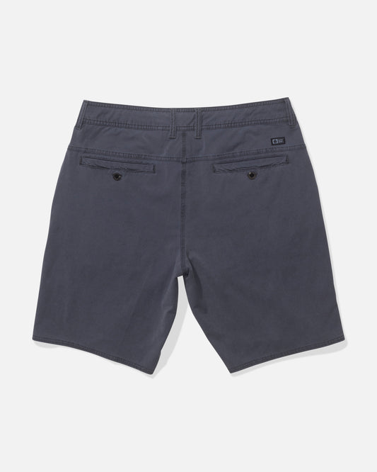 Back view of Salty Crew’s Transom 19" Overdye Short in Magnet, featuring belt loops, two back button pockets, visible stitching, and quick-dry fabric, laid flat on a white background.