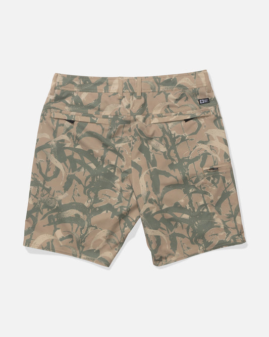 Back view of Salty Crew Transom 19" Tech Short in Kelp Camo, made from recycled polyester, featuring two back pockets and a small black logo tag above the right pocket, shown on a white background.
