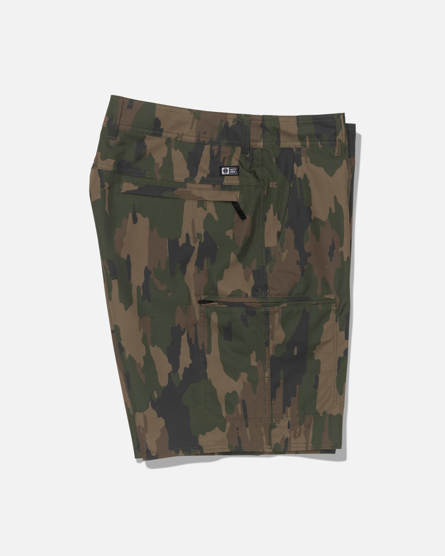 The Salty Crew Transom 19″ Tech Short - Ranger is a pair of green and brown camouflage-patterned straight leg shorts, made from recycled polyester with a zipper pocket, shown folded on a plain white background.