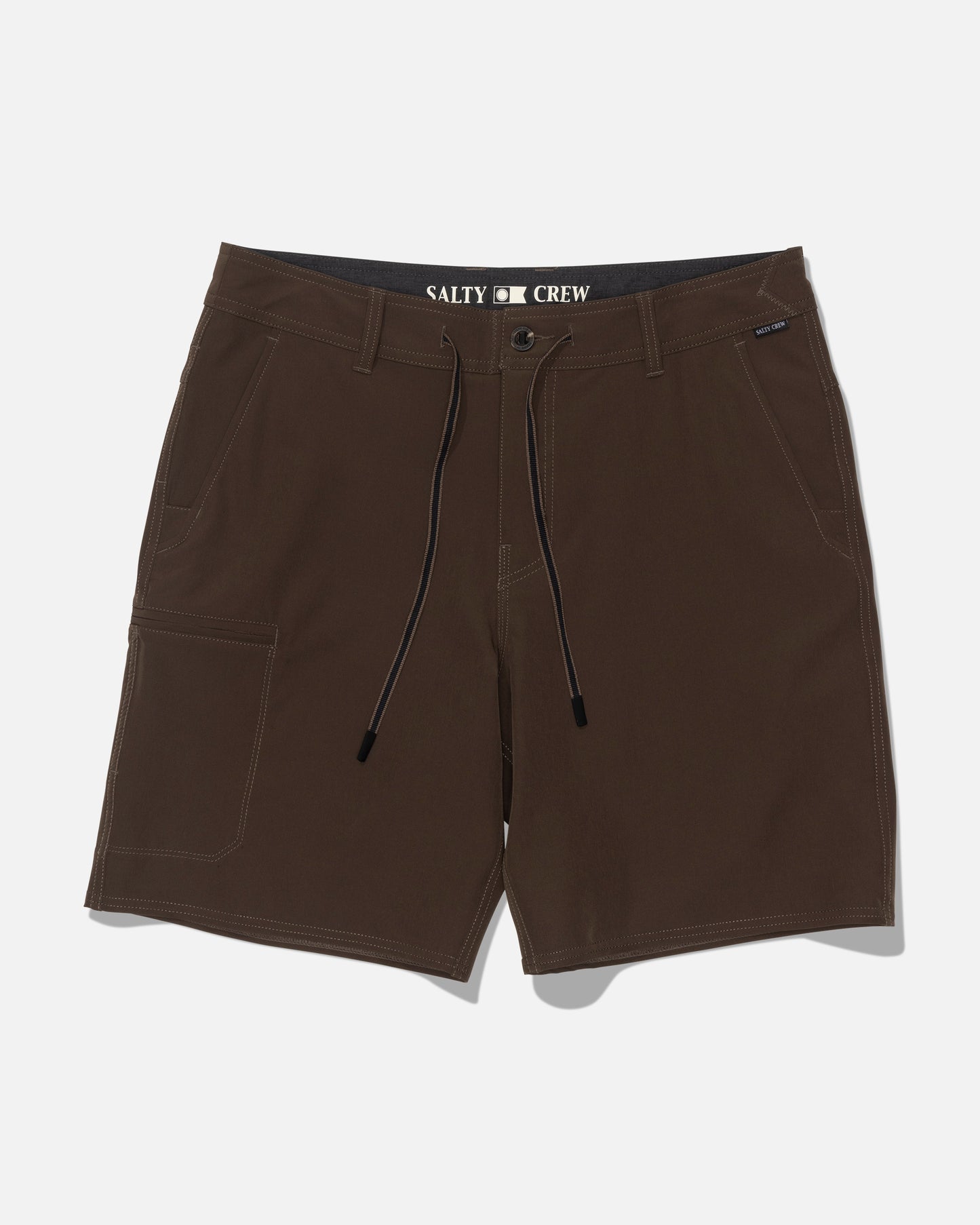 The Salty Crew Transom 19″ Tech Short in washed brown features front and side pockets, a black drawstring, button closure, and an inner waistband label. Made from quick-dry fabric with 4-way stretch for all-day comfort, these men’s shorts are displayed on a plain white background.