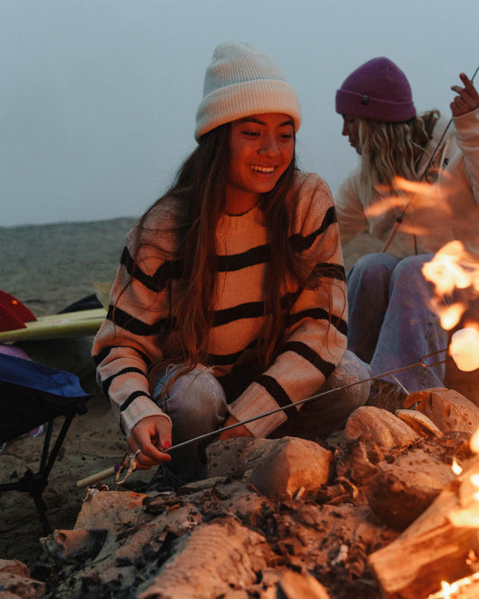 Lifestyle shot of the Breezer Beanie - Off White. 