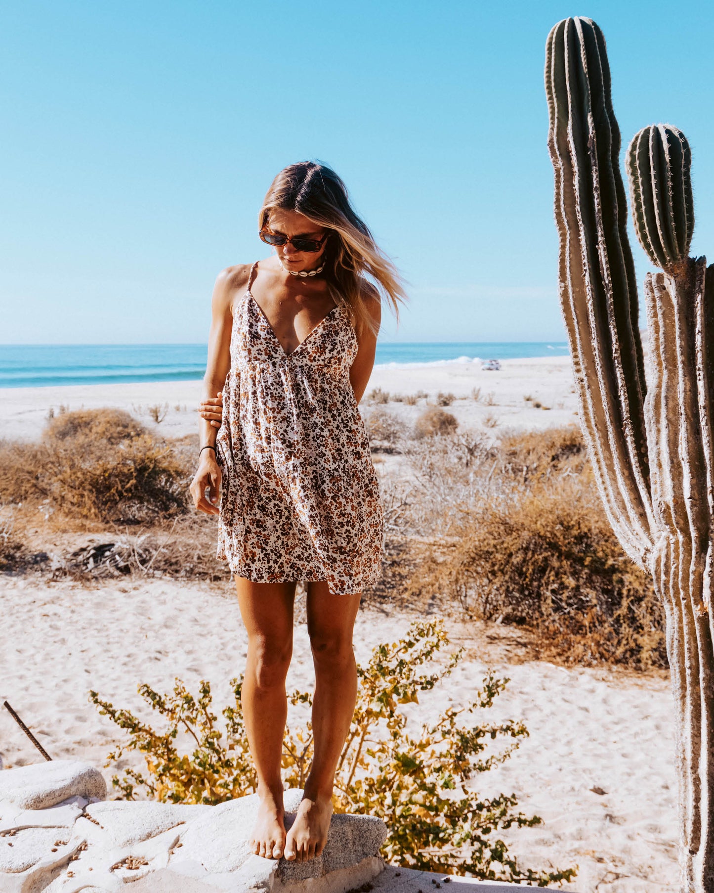 Lifestyle shot of the Hidden Ditsy Dress - Chocolate. 