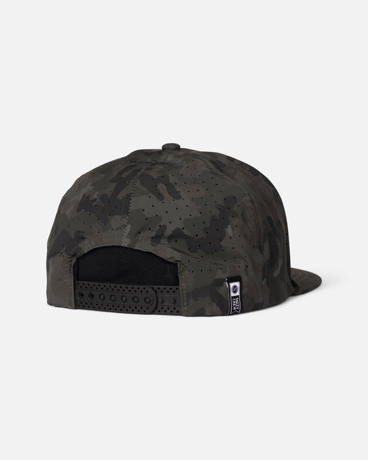 The Salty Crew Long Range Tech Snapback - Camo is shown from the back, highlighting its dark green and black camo design, black adjustable strap, laser-cut ventilation panels, and a small woven side label against a plain white background.