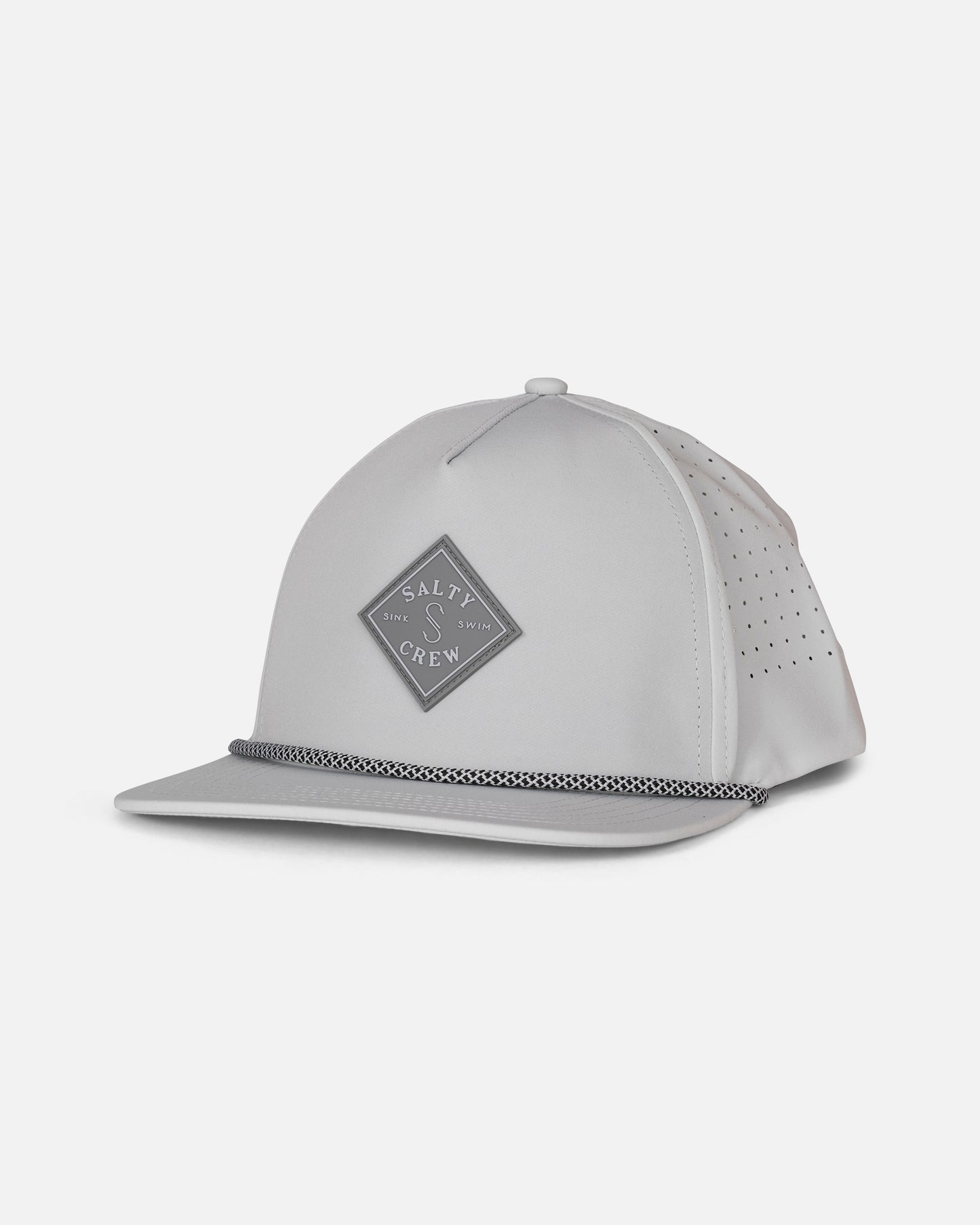 The Long Range Snapback - Harbor Grey by Salty Crew features a light gray polyester construction with a structured, water-resistant design. This snapback hat showcases a flat brim, a diamond-shaped Salty Crew logo patch on the front, perforated side panels for breathability, and a braided rope detail along the brim. The background is plain white.