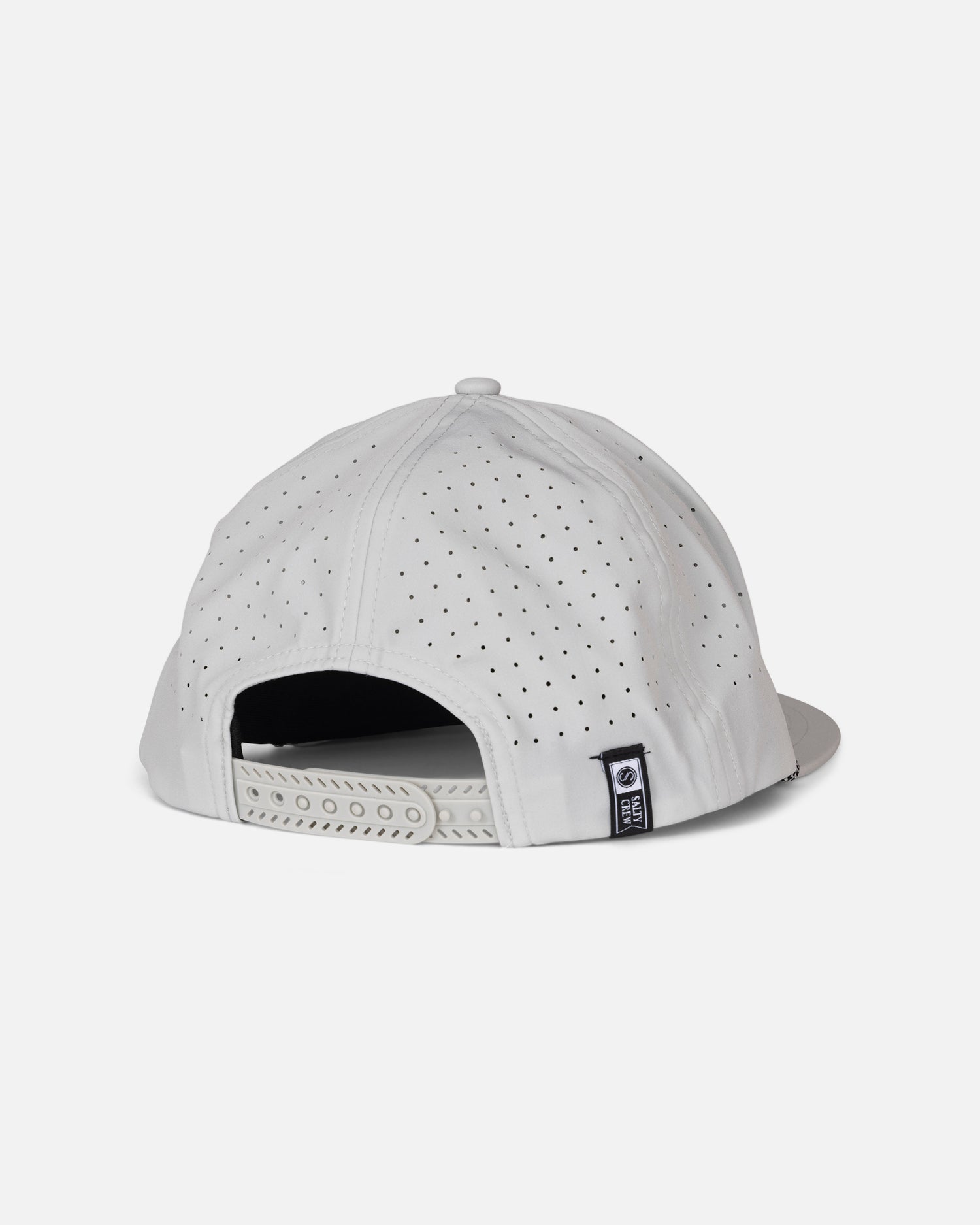 The Long Range Snapback - Harbor Grey by Salty Crew is a white polyester structured cap, displayed from the back, highlighting its small ventilation holes, adjustable snapback strap, and a small black and white Salty Crew label on the side.