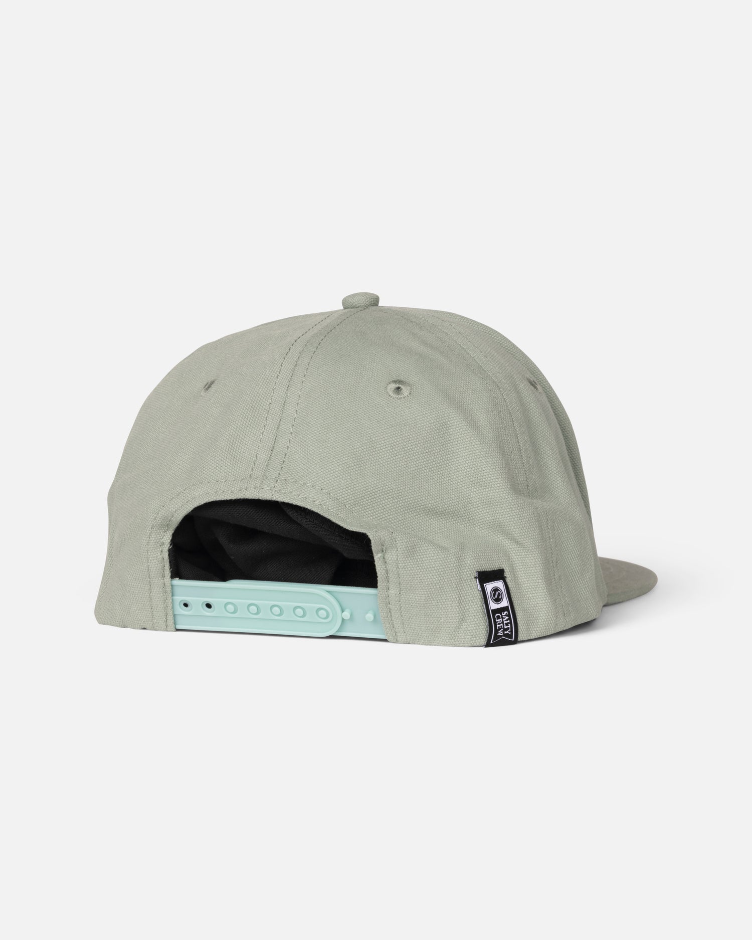 The Salty Crew Coastal Boys Snapback - Marine is a light gray 5-panel baseball cap shown from the back, featuring a mint green adjustable snapback strap and a small black tag near the opening. Made from soft cotton canvas on a plain white background.