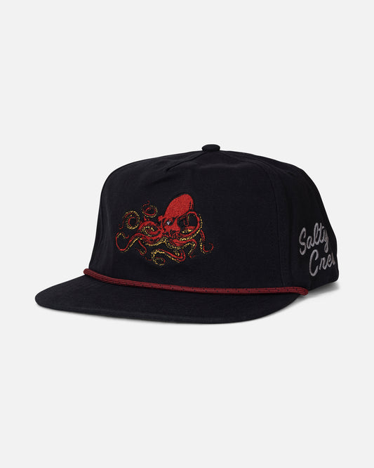 Introducing the Salty Crew Coastal Snapback - Black: a durable cotton canvas 5-panel snapback hat featuring a bold red and yellow embroidered octopus on the front, a red cord detail above the brim, and “Salty Crew” stitched in white on the side.