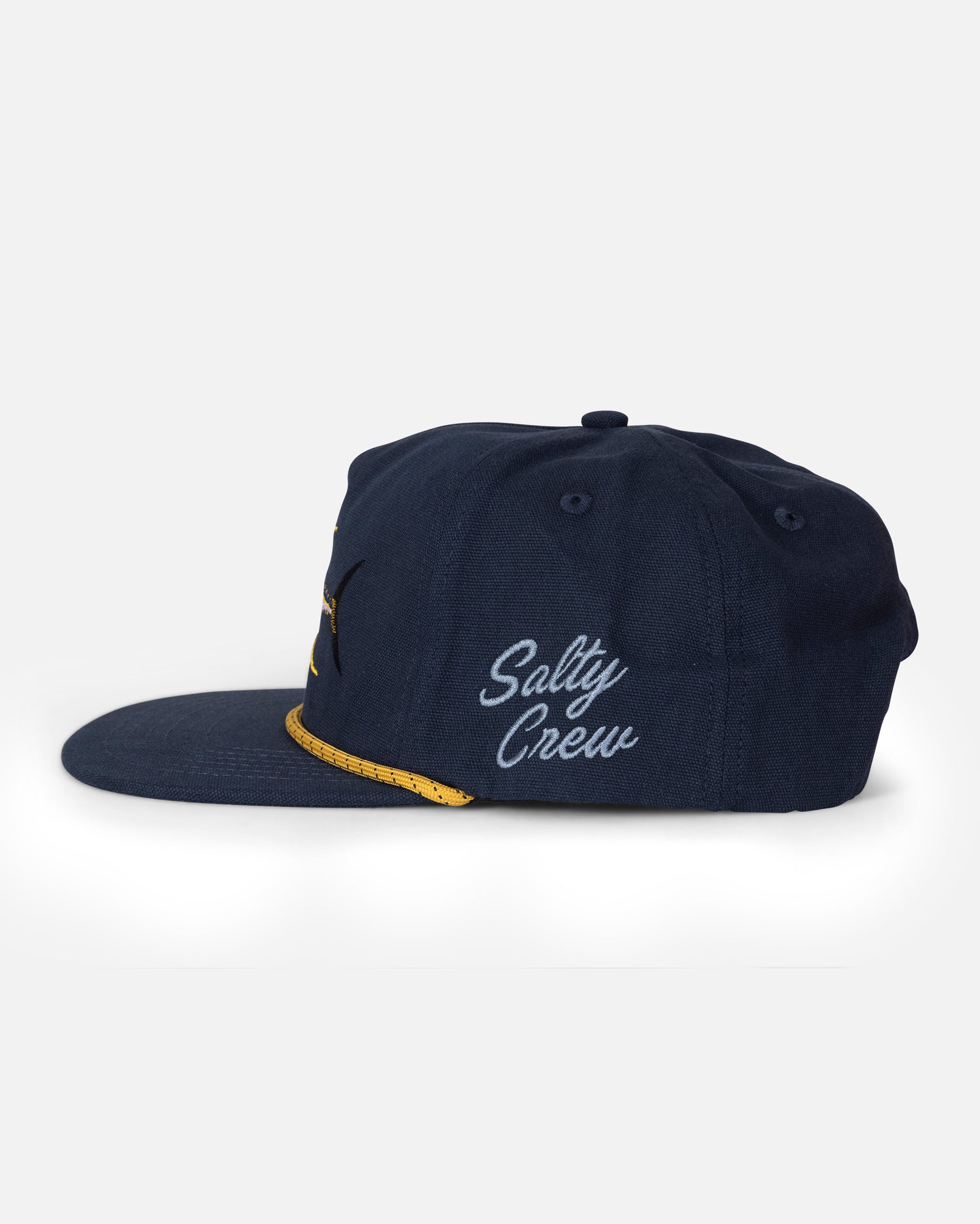 The Coastal Snapback - Navy by Salty Crew is a navy blue cotton 5-panel snapback hat featuring “Salty Crew” embroidered in white script on the side and a yellow accent on the brim, displayed against a plain light gray background.